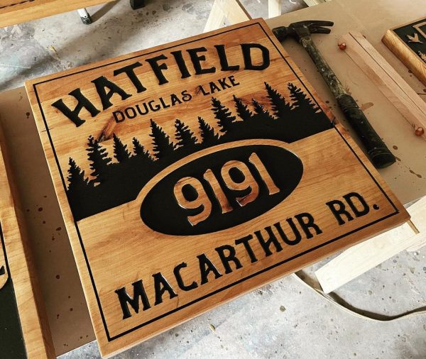 carved wood cabin address street name sign