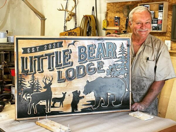 Rustic Sign with Wildlife Imagery