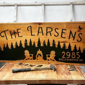 Address family Sign with Scenic Landscape