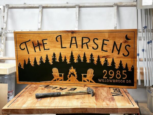 Address family Sign with Scenic Landscape