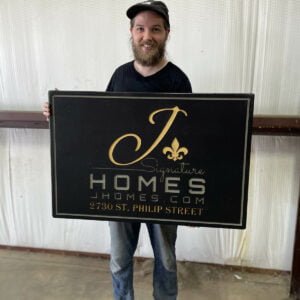 Black Restaurant Sign with Multicolored Logo
