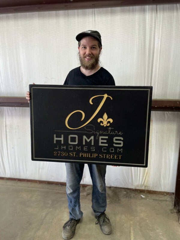 Black Restaurant Sign with Multicolored Logo