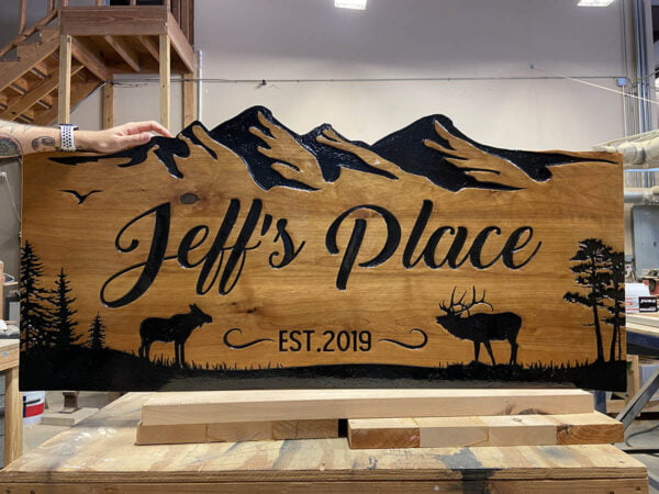 Cabin Sign with Unique Edge and Mountain Imagery